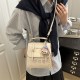 Wholesale fashionable color-blocking hand-held small square bags for women, new spring 2025 light luxury and stylish single-shoulder bags for commuting backpacks