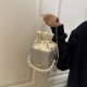 Wholesale popular niche pearl hand-held bucket bags for women, new spring 2025 light luxury single-shoulder bags and casual crossbody bags Wholesale popular niche pearl hand-held bucket bags for women, new spring 2025 light luxury single-shoulder bags and casual crossbody bags
