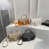 Wholesale Korean version light luxury hand-held small square bags for women, 2025 summer new fashionable and trendy single-shoulder bags for commuting crossbody bags