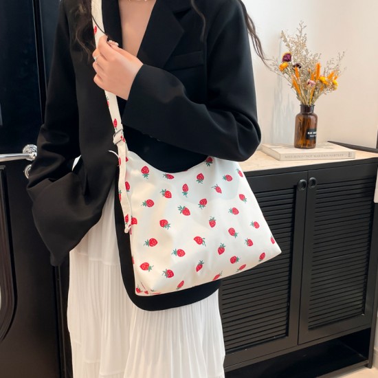 Wholesale Korean-style fashionable and fresh hand-held tote bags for women, 2025 spring new large-capacity single-shoulder bags, and trendy crossbody bags