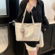 Wholesale ethnic-style hand-held tote bags for women, 2025 summer new models, color-matching, versatile single-shoulder bags, large-capacity underarm bags Wholesale ethnic-style hand-held tote bags for women, 2025 summer new models, color-matching, versatile single-shoulder bags, large-capacity underarm bags