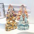 Wholesale fashionable flower-shaped hand-held small handbags for women, 2025 summer new models, large-capacity pleated single-shoulder bags, and trendy underarm bags