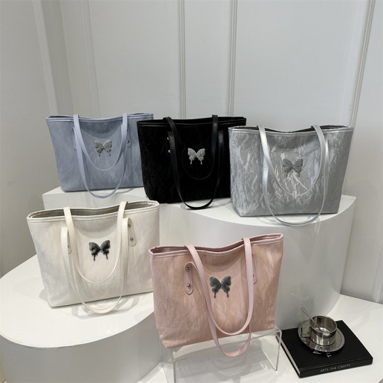 The high-end Tote bag for women in 2024, a versatile and fashionable commuting handbag, is a trendy large-capacity single-shoulder bag for going out