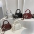 Wholesale fashionable and simple hand-held small square bags for women, 2025 summer new pearl bow single-shoulder bags and trendy crossbody bags