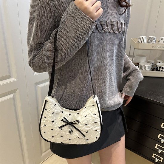 Wholesale niche design hand-held crescent-shaped women's bags, 2025 summer new bow single-shoulder bags, trendy and popular underarm bags Wholesale niche design hand-held crescent-shaped women's bags, 2025 summer new bow single-shoulder bags, trendy and popular underarm bags