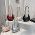 Wholesale Korean-style hand-held crescent-shaped women's bags, 2025 summer new styles, simple and versatile single-shoulder bags, trendy and trendy crossbody bags