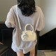 Wholesale fashionable and niche hand-held small square bags for women, 2025 spring new styles of light luxury and stylish single-shoulder bags for commuting crossbody bags Wholesale fashionable and niche hand-held small square bags for women, 2025 spring new styles of light luxury and stylish single-shoulder bags for commuting crossbody bags