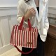 Commuter large-capacity hand-held tote bag for women, new 2024 autumn and winter collection, personalized striped single-shoulder bag, trendy casual crossbody bag Commuter large-capacity hand-held tote bag for women, new 2024 autumn and winter collection, personalized striped single-shoulder bag, trendy casual crossbody bag