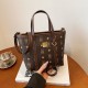The new 2024 autumn and winter women's light luxury texture hand-held tote bag is a fashionable and high-end single-shoulder bag and a trendy commuting crossbody bag