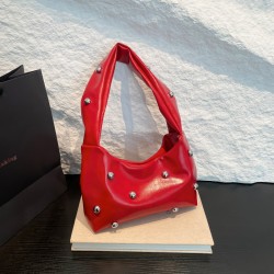 Wholesale of niche design rivet hand-held small handbags for women in Spring 2025, versatile single-shoulder bags for commuting and underarm bags
