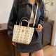 The new 2024 autumn and winter women's light luxury texture hand-held tote bag is a fashionable and high-end single-shoulder bag and a trendy commuting crossbody bag