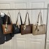 Wholesale light luxury silk scarves, bow tie hand-held tote bags, women's bags, 2025 summer new style patchwork single-shoulder bags, trendy underarm bags