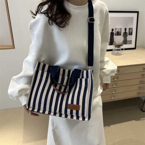 Commuter large-capacity hand-held tote bag for women, new 2024 autumn and winter collection, personalized striped single-shoulder bag, trendy casual crossbody bag Commuter large-capacity hand-held tote bag for women, new 2024 autumn and winter collection, personalized striped single-shoulder bag, trendy casual crossbody bag