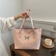 The high-end Tote bag for women in 2024, a versatile and fashionable commuting handbag, is a trendy large-capacity single-shoulder bag for going out
