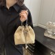 Wholesale Korean-style simple hand-held bucket bags for women, 2025 summer new woven single-shoulder bags, trendy chain crossbody bags Wholesale Korean-style simple hand-held bucket bags for women, 2025 summer new woven single-shoulder bags, trendy chain crossbody bags