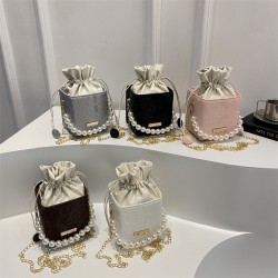 Wholesale popular niche pearl hand-held bucket bags for women, new spring 2025 light luxury single-shoulder bags and casual crossbody bags