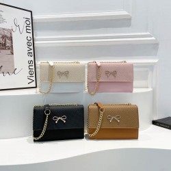 Wholesale fashionable and light luxury small square women's bags, 2025 spring new style bow lock single-shoulder bags, trendy chain crossbody bags