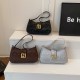Wholesale fashionable and high-quality hand-held small handbags for women, 2025 summer new snake-patterned single-shoulder bags, and retro commuter underarm bags Wholesale fashionable and high-quality hand-held small handbags for women, 2025 summer new snake-patterned single-shoulder bags, and retro commuter underarm bags