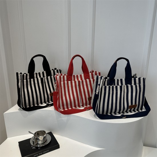 Commuter large-capacity hand-held tote bag for women, new 2024 autumn and winter collection, personalized striped single-shoulder bag, trendy casual crossbody bag Commuter large-capacity hand-held tote bag for women, new 2024 autumn and winter collection, personalized striped single-shoulder bag, trendy casual crossbody bag