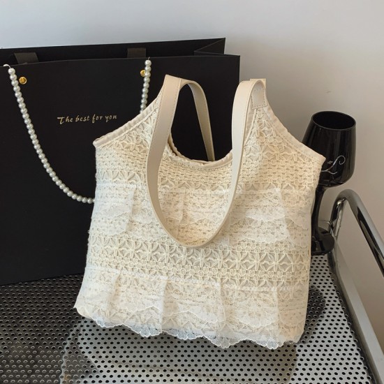 The 2025 summer new fairy tote bag with a chic texture and a casual sweet style is a versatile handbag
