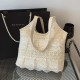 The 2025 summer new fairy tote bag with a chic texture and a casual sweet style is a versatile handbag