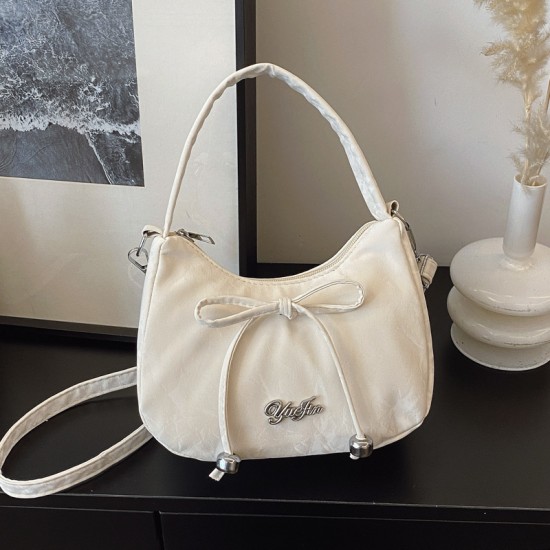 A niche and high-quality handbag for women in the summer of 2025, featuring a fresh and sweet bow bow single-shoulder bag for commuting and crossbody underarm bag A niche and high-quality handbag for women in the summer of 2025, featuring a fresh and sweet bow bow single-shoulder bag for commuting and crossbody underarm bag