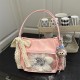 Wholesale niche design fashionable hand-held tote bags for women in spring 2025, stylish single-shoulder bags and casual underarm bags Wholesale niche design fashionable hand-held tote bags for women in spring 2025, stylish single-shoulder bags and casual underarm bags