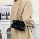 The new candy-colored pleated small square bag for women in the autumn of 2023 is a fashionable and fresh water diamond bag. It's a stylish single-shoulder crossbody bag