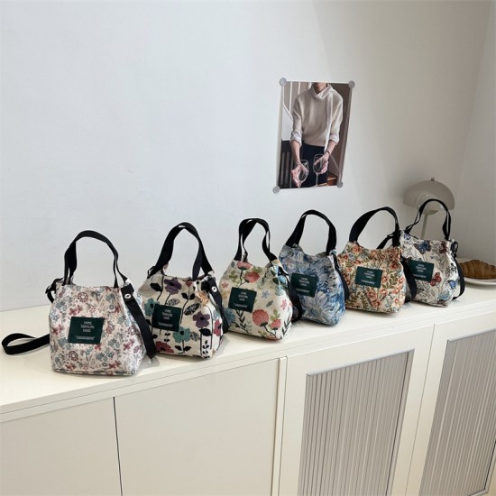Wholesale sweet style hand-held bucket bags for women, 2025 summer new fashion floral single-shoulder bags, trendy crossbody bags Wholesale sweet style hand-held bucket bags for women, 2025 summer new fashion floral single-shoulder bags, trendy crossbody bags