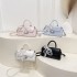 Wholesale Korean version light luxury hand-held small square bags, women's bags, 2025 summer new fashion lock button single-shoulder bags, commuting crossbody bags