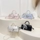 Wholesale Korean version light luxury hand-held small square bags, women's bags, 2025 summer new fashion lock button single-shoulder bags, commuting crossbody bags Wholesale Korean version light luxury hand-held small square bags, women's bags, 2025 summer new fashion lock button single-shoulder bags, commuting crossbody bags