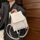 The 2025 summer new student casual small backpack is a versatile crossbody bag, featuring a trendy and simple solid-color backpack