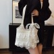 The 2025 summer new fairy tote bag with a chic texture and a casual sweet style is a versatile handbag