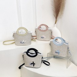 Wholesale Korean version straw woven color-blocking hand-held bucket bags for women, 2025 summer new stylish single-shoulder bags, versatile crossbody bags