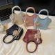 Wholesale fashionable Korean-style hand-held bucket bags, women's bags, 2025 summer new light luxury single-shoulder bags, commuter versatile crossbody bags