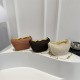 Wholesale niche design straw woven hand-held ingots, women's bags, 2025 summer new chain single-shoulder bags, versatile crossbody bags