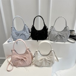 Wholesale fashionable bow bow hand-held crescent moon bags for women, 2025 spring new styles of light luxury and stylish single-shoulder bags, trendy crossbody bags
