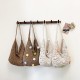 Wholesale sweet style hand-held tote bags for women in summer 2025, new hollowed-out flower single-shoulder bags, trendy underarm bags Wholesale sweet style hand-held tote bags for women in summer 2025, new hollowed-out flower single-shoulder bags, trendy underarm bags