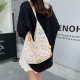 Wholesale sweet style hand-held tote bags for women in summer 2025, new hollowed-out flower single-shoulder bags, trendy underarm bags Wholesale sweet style hand-held tote bags for women in summer 2025, new hollowed-out flower single-shoulder bags, trendy underarm bags