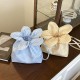 Wholesale fresh and sweet style hand-held bucket bags for women, 2025 summer new checkered flower single-shoulder bags, trendy crossbody bags Wholesale fresh and sweet style hand-held bucket bags for women, 2025 summer new checkered flower single-shoulder bags, trendy crossbody bags