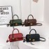 A light luxury texture retro hand-held small square bag for women, a new winter 2024 fashion lock single-shoulder bag with a high-end feel, and a crossbody bag