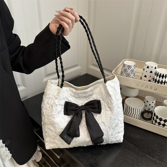 Wholesale beautiful bow tie hand-held tote bags for women, 2025 summer new large-capacity single-shoulder bags for commuting underarm bags Wholesale beautiful bow tie hand-held tote bags for women, 2025 summer new large-capacity single-shoulder bags for commuting underarm bags