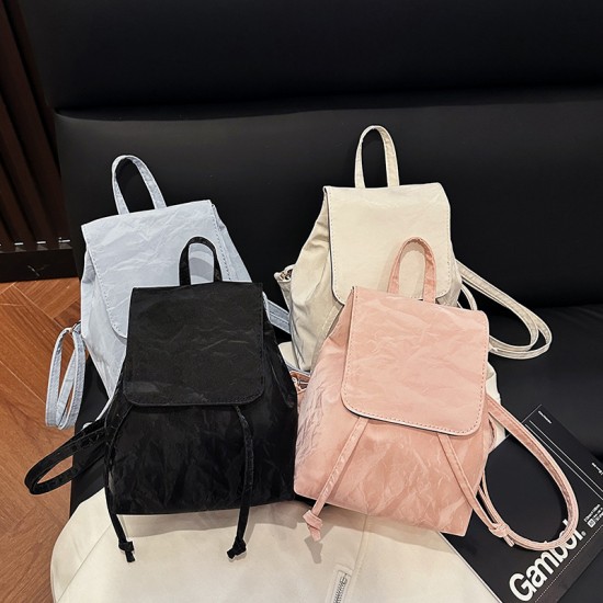 The 2025 summer new student casual small backpack is a versatile crossbody bag, featuring a trendy and simple solid-color backpack