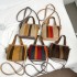 Wholesale Japanese Harajume-style hand-held bucket bags for women, 2025 summer new striped color-blocking single-shoulder bags, trendy crossbody bags