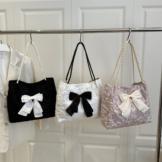 Wholesale beautiful bow tie hand-held tote bags for women, 2025 summer new large-capacity single-shoulder bags for commuting underarm bags Wholesale beautiful bow tie hand-held tote bags for women, 2025 summer new large-capacity single-shoulder bags for commuting underarm bags
