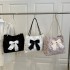 Wholesale beautiful bow tie hand-held tote bags for women, 2025 summer new large-capacity single-shoulder bags for commuting underarm bags