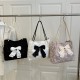 Wholesale beautiful bow tie hand-held tote bags for women, 2025 summer new large-capacity single-shoulder bags for commuting underarm bags Wholesale beautiful bow tie hand-held tote bags for women, 2025 summer new large-capacity single-shoulder bags for commuting underarm bags