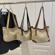 Wholesale Japanese Harajume-style hand-held tote bags for women in the summer of 2025, with contrasting colors and perforated single-shoulder bags, trendy underarm bags Wholesale Japanese Harajume-style hand-held tote bags for women in the summer of 2025, with contrasting colors and perforated single-shoulder bags, trendy underarm bags