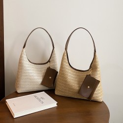 The new summer beach bag is stylish and versatile, the commuter tote bag is fashionable and ethnic-style, and it is a grass-woven underarm bag or handbag