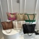 Wholesale fashionable color-blocking straw woven hand-held tote bags for women, 2025 summer new large-capacity single-shoulder bags, trendy underarm bags Wholesale fashionable color-blocking straw woven hand-held tote bags for women, 2025 summer new large-capacity single-shoulder bags, trendy underarm bags